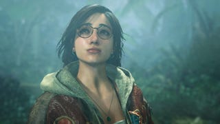 Monster Hunter Wilds screenshot showing close up of dark-haired woman with glasses