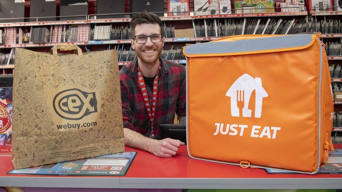 A CEX employee with a JustEat bag.