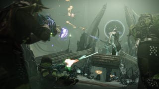 A screenshot from Destiny 2's latest season, Heresy, shows Guardians concentrating fire on an imposing enemy