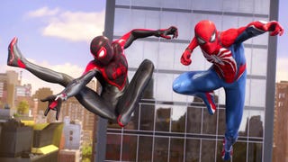 marvel's spider-man 2 key art showing two spider-men near a reflective building