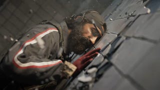 Close up on bearded soldier leaning against a wall in Call of Duty Verdansk teaser trailer